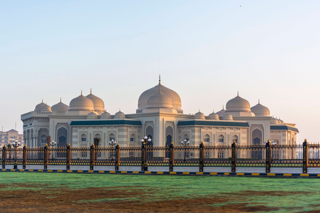 Beautiful Islamic architecture featuring domes and minarets in Sharjah, UAE.